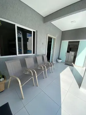 Uma área de estar em Casa com Piscina aquecida em Balneário Camboriú