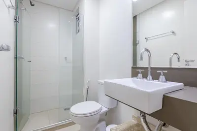 Uma casa de banho em Boulevard - Apartamento Pertinho da Praia