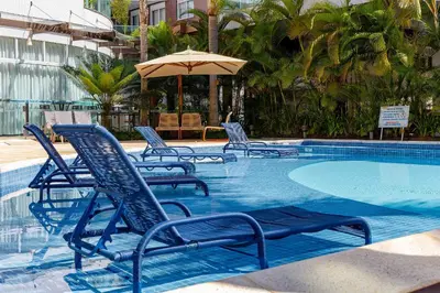 A piscina em ou perto de Boulevard - Apartamento Pertinho da Praia