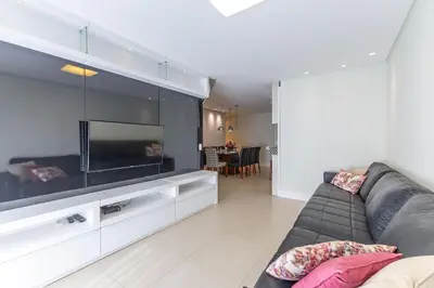 Uma televisão e/ou sistema de entretenimento em Apartamento em Condo com Piscina e Jacuzzi