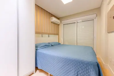 Uma cama ou camas num quarto em Apartamento em Condo com Piscina e Jacuzzi