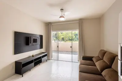 Uma televisão e/ou sistema de entretenimento em RHE's - Casas em condomínio 2 min da praia em Bombinhas