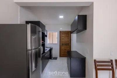 A cozinha ou kitchenette de RHE's - Casas em condomínio 2 min da praia em Bombinhas