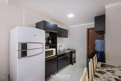 A cozinha ou kitchenette de RHE's - Casas em condomínio 2 min da praia em Bombinhas