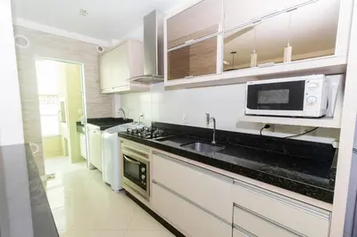 A cozinha ou kitchenette de 084 - Apto a 50m do mar em Bombas