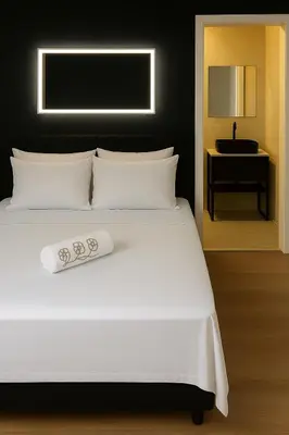 Uma cama ou camas num quarto em Hotel Pousada Litorânea