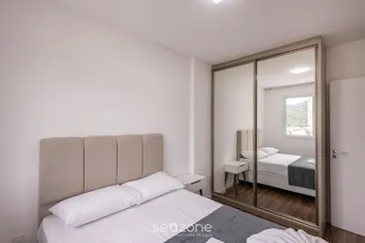 Uma cama ou camas num quarto em Apto Vista Mar c/ churrasq. em Itapema SBN0705