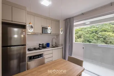 A cozinha ou kitchenette de Apto Vista Mar c/ churrasq. em Itapema SBN0705