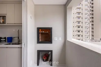 A cozinha ou kitchenette de Apto Vista Mar c/ churrasq. em Itapema SBN0705