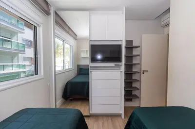 Uma cama ou camas num quarto em Varandas do Atlântico 305A – Frente Mar em Bombas