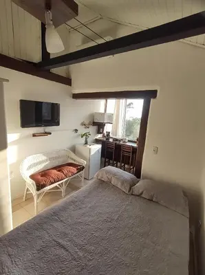 Uma cama ou camas num quarto em Apart 3 Costa Esmeralda