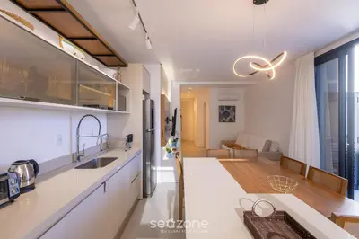 A cozinha ou kitchenette de Apto 2Q c/ Churrasq. a 600m da Praia VRE102