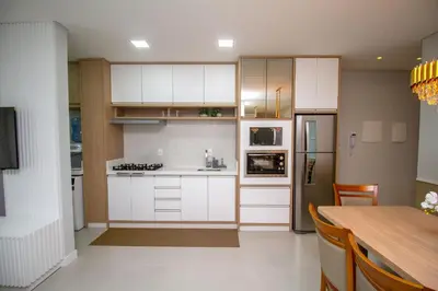 A cozinha ou kitchenette de 007A - Apartamento a poucos metros do mar