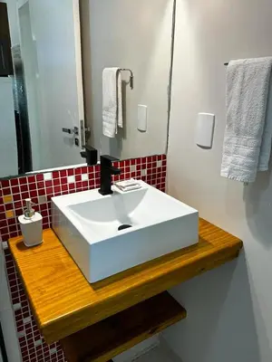 Uma casa de banho em Bombinhas Guest House