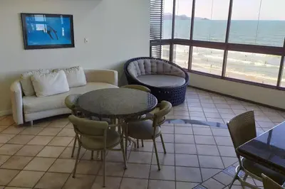 Uma área de estar em Cobertura - Frente para o mar