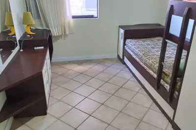 Uma cama ou camas num quarto em Cobertura - Frente para o mar