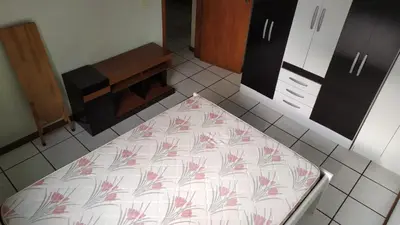 A cozinha ou kitchenette de Apartamento na quadra do mar