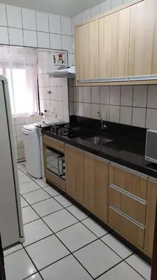 A cozinha ou kitchenette de Apartamento na quadra do mar