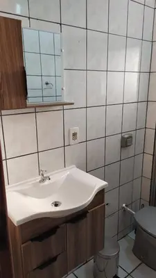 Uma casa de banho em Apartamento na quadra do mar