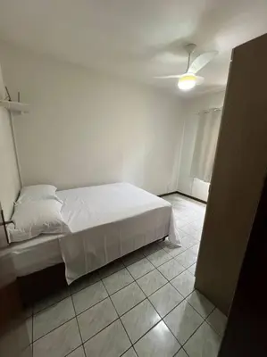 Uma cama ou camas num quarto em Casa térrea - bem localizada