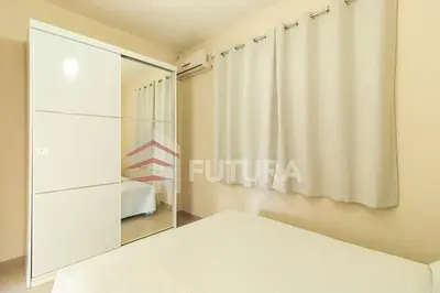 Uma cama ou camas num quarto em LINDA CASA COM PISCINA PARA ALUGUEL DE TEMPORADA EM BOMBAS