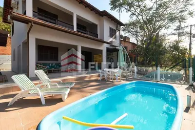 A piscina em ou perto de LINDA CASA COM PISCINA PARA ALUGUEL DE TEMPORADA EM BOMBAS