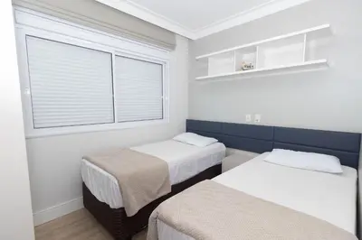 Uma cama ou camas num quarto em Varandas do Atlântico 306A – Frente Mar em Bombas