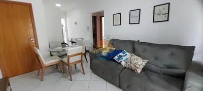 Uma área de estar em Apartamento no centro da praia com piscina - AP 80