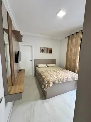 Uma cama ou camas num quarto em Casa aconchegante !