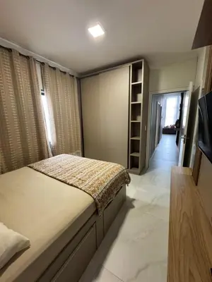 Uma cama ou camas num quarto em Casa aconchegante !