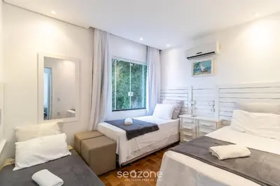 Uma cama ou camas num quarto em Sobrado Bela Vista c/Churrasq em Bombinhas AGS0642