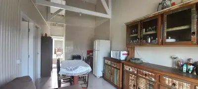 A cozinha ou kitchenette de Casa com piscina A 250 METROS DA PRAIA de Canto Grande BOMBINHAS
