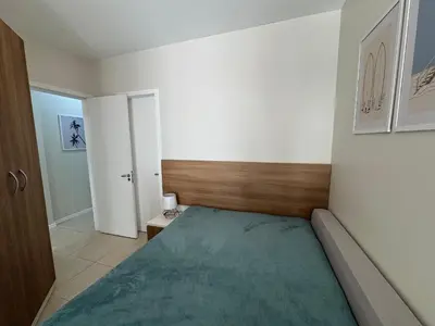 Uma cama ou camas num quarto em Salema 202 - apartamento 02 dormitórios