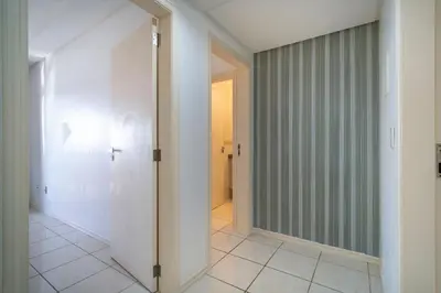 Uma casa de banho em A08 - Laélia Purpurata - Apartamento frente mar 03 dormitórios