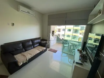 Uma televisão e/ou sistema de entretenimento em A15 - APARTAMENTO 2 DORMITÓRIOS NO CENTRO DE BOMBINHAS ALUGUEL DE TEMPORADA