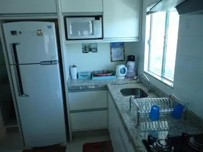 A cozinha ou kitchenette de A15 - APARTAMENTO 2 DORMITÓRIOS NO CENTRO DE BOMBINHAS ALUGUEL DE TEMPORADA