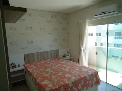 Uma cama ou camas num quarto em A15 - APARTAMENTO 2 DORMITÓRIOS NO CENTRO DE BOMBINHAS ALUGUEL DE TEMPORADA