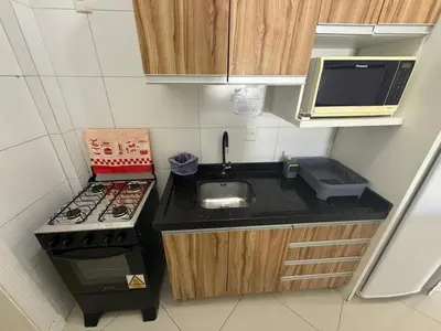 A cozinha ou kitchenette de A26 - APARTAMENTO 2 DORMITÓRIOS NO CENTRO DE BOMBINHAS