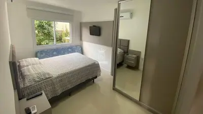 Uma cama ou camas num quarto em A38 - Vienna Park Apartamento 2 dormitórios