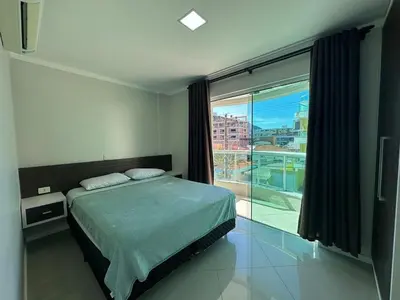 Uma cama ou camas num quarto em A56 - Alameda Verde - Apto 102 - Centro de Bombinhas