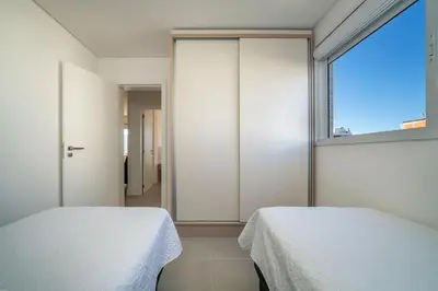 Uma cama ou camas num quarto em A103 - Residencial Badejo