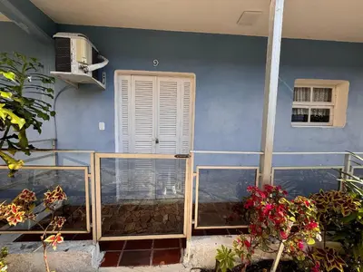 Um jardim no exterior de A69 - Maria Olga - Apartamento de 01 dormitório.