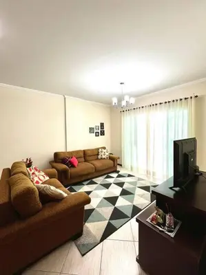 Uma área de estar em Residencial Caravelas - Apto Completo 150m da Praia