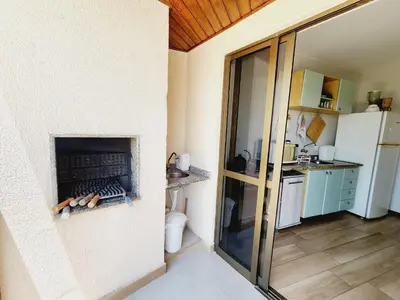 A cozinha ou kitchenette de Sobrado 30 m praia, quartos climatizados, 1 vaga, até 6 pessoas