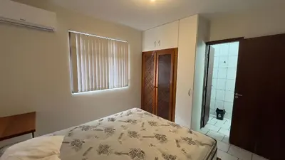 Uma cama ou camas num quarto em 604 - Apto 2 dormitórios a 50m da praia de Bombas