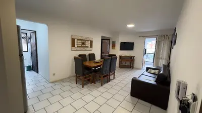 Uma televisão e/ou sistema de entretenimento em 604 - Apto 2 dormitórios a 50m da praia de Bombas