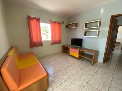 Uma televisão e/ou sistema de entretenimento em cód 101 - Apartamento á apenas 100m do mar!