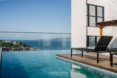 A piscina em ou perto de MHFBs - Edifício Moderno c/ piscina vista mar em Itapema
