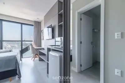 Uma cama ou camas num quarto em MHFBs - Edifício Moderno c/ piscina vista mar em Itapema