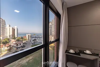 Uma varanda ou terraço em MHFBs - Edifício Moderno c/ piscina vista mar em Itapema